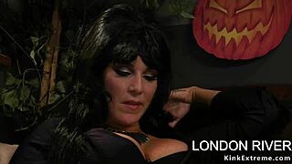 Bound milf takes lesbian halloween strapon anal fucking from dominant babe
