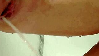 Whoa cute russian girlfriend fingers shaved pussy in steamy shower!