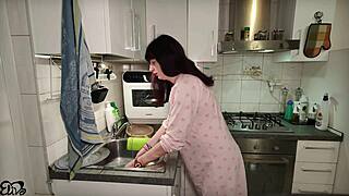 Fresh from dishes this pregnant Italian wife grabs her big tits for a creamy titjob