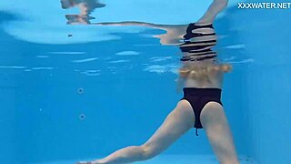 Mimi Cica strips naked by the pool for you