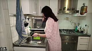 Fresh from dishes this pregnant Italian wife grabs her big tits for a creamy titjob