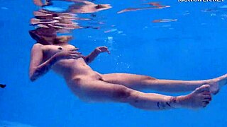 Mimi Cica strips naked by the pool for you