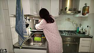 Fresh from dishes this pregnant Italian wife grabs her big tits for a creamy titjob
