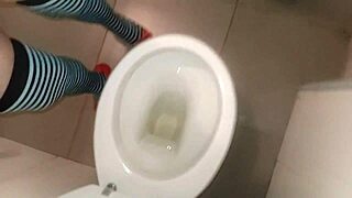 Peeing with my husband dressed as a woman we go to the bathroom together