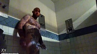 White tattooed prisoner masturbates his big cock. He gets a wet cumshot in prison