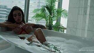 Busty russian babe megan teasing from the bathtub