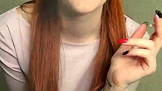 Stunning Redhead Enjoying A Relaxing Smoke Session Alone