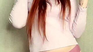 Stunning Redhead Enjoying A Relaxing Smoke Session Alone