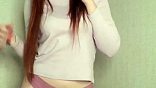Stunning Redhead Enjoying A Relaxing Smoke Session Alone