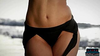 german milf jasmin gives a beach striptease