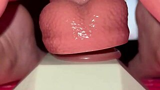 Tiny redhead rides a fence post cock