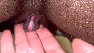 ebony teen pushes out creampie