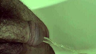 People take an early morning shower and pee while bathing at home