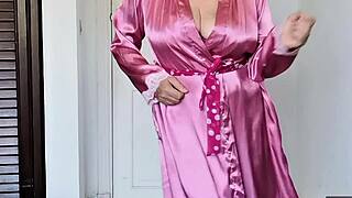 granny does striptease in pink silk and ends with joi